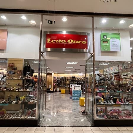 Logo da loja leao de ouro