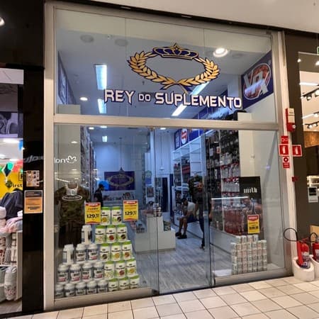Logo da loja rey do suplemento
